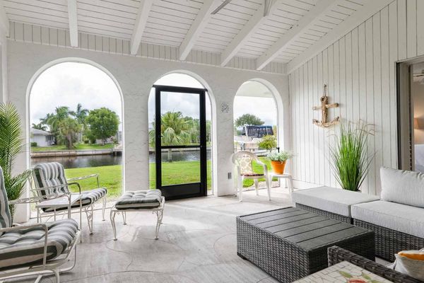 Relaxing lanai with canal views