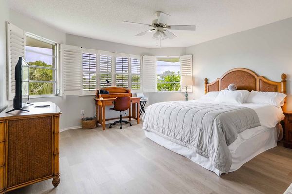 King bed in the master bedroom overlooking the canal