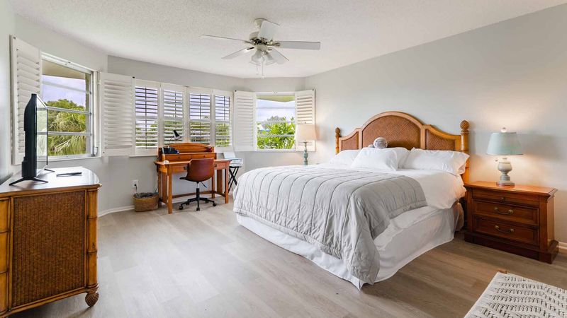 King bed in the master bedroom overlooking the canal