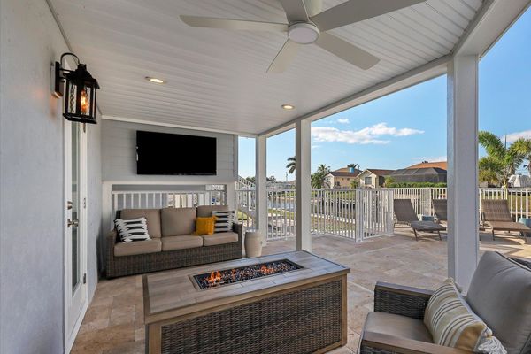 The pool deck is the perfect place to spend your time with a fire table and comfortable seating for gatherings