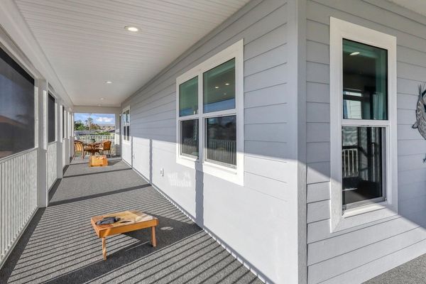 Huge wrap-around deck we have cornhole boards!