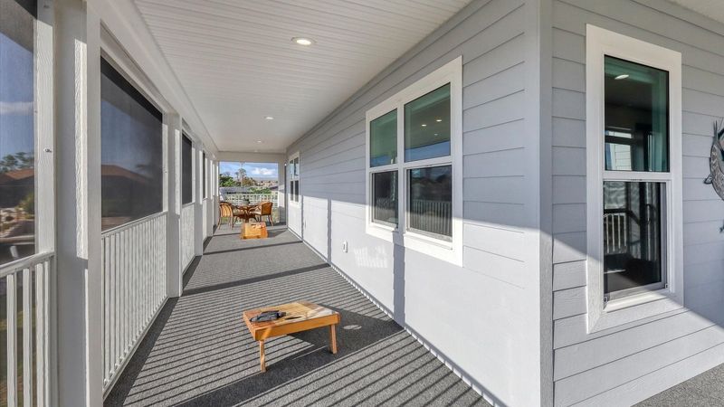 Huge wrap-around deck we have cornhole boards!