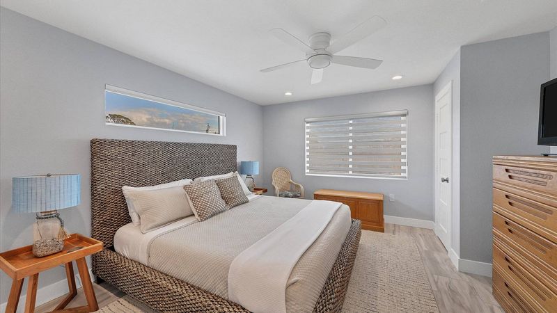 King bed in the first master with ensuite bathroom