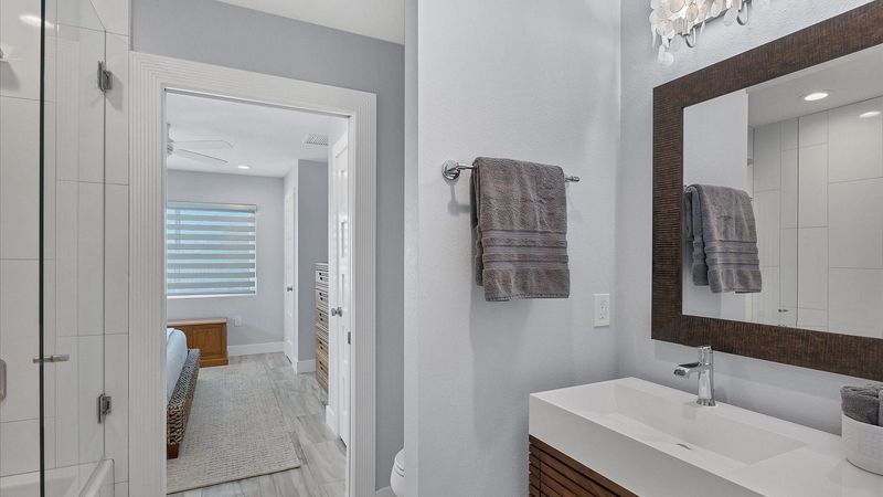 Guest bathroom access from the king bedroom and the hallway