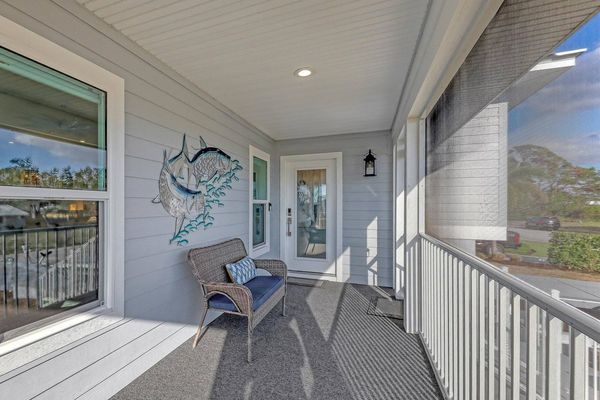 Enjoy the spacious wrap-around deck on the second story.