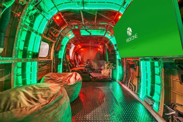 A game room with virtual reality games as well as simulators.