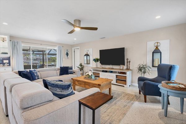 Beautiful living room with lanai access
TV-65" Roku