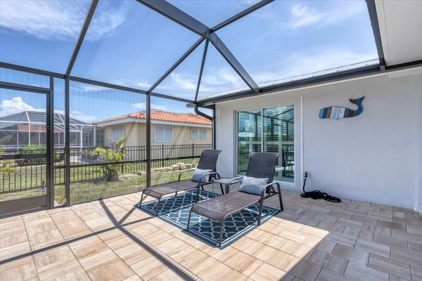 Chaise lounge chairs on pool deck