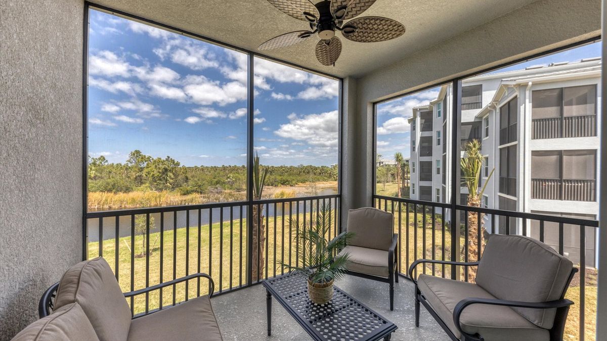 Incredible second floor views over the quiet pond and wetlands leading out to Charlotte Harbor
