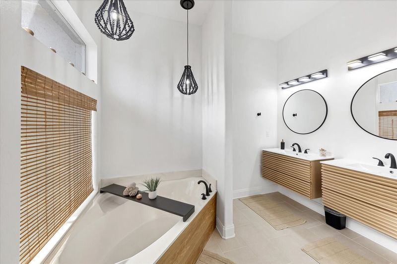 Soaking tub in master bathroom