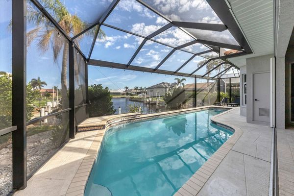 Spacious pool overlooking the canal waters (Boat lift not available)
