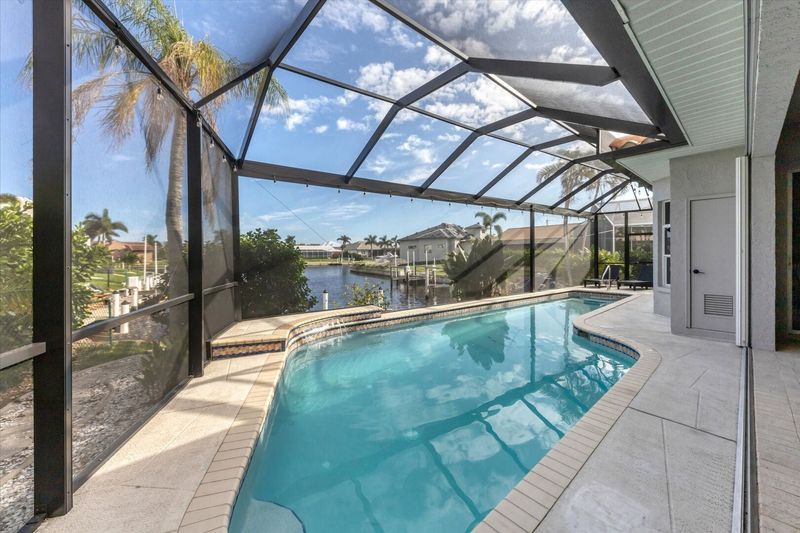 Spacious pool overlooking the canal waters (Boat lift not available)