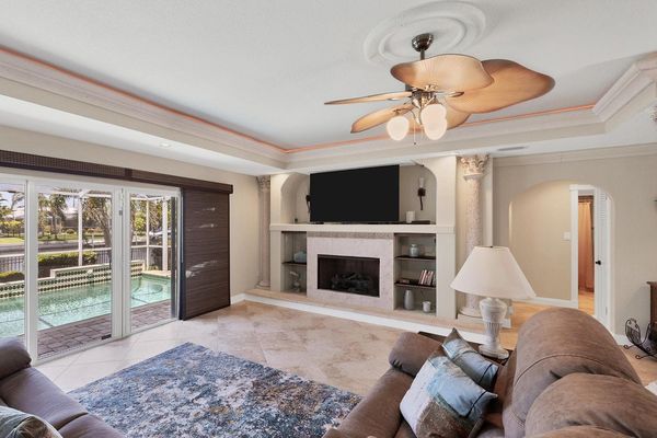 Comfortable living room overlooking the pool