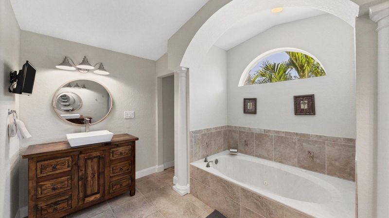 Master bathroom with garden tub and dual vanities