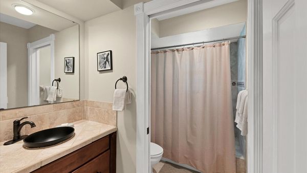 Second bathroom with combo tub and shower