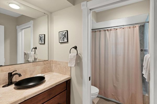 Second bathroom with combo tub and shower