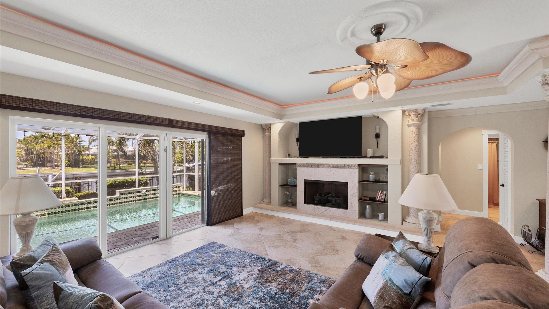 Comfortable living room overlooking the pool