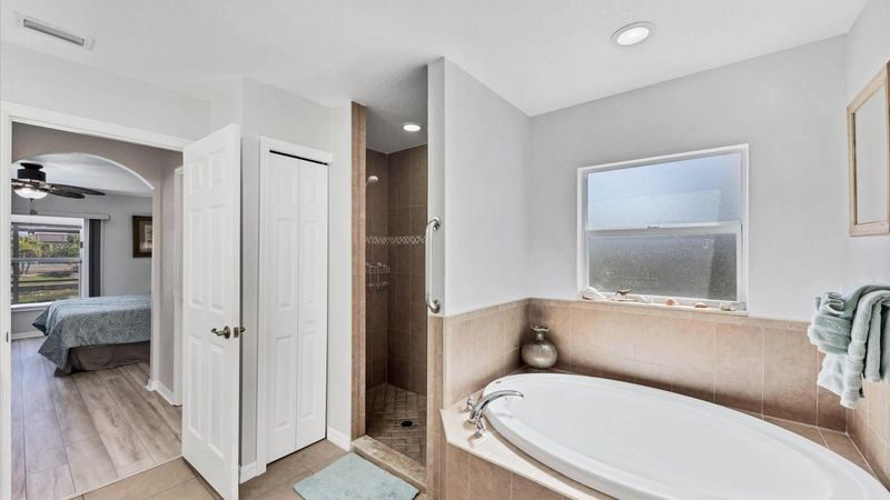 Master bathroom with garden tub and walk in shower
