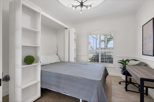 Office space has a full size Murphy bed for extra sleeping space