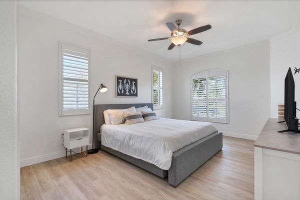 Guest bedroom has a king bed and two pullout twin trundle beds