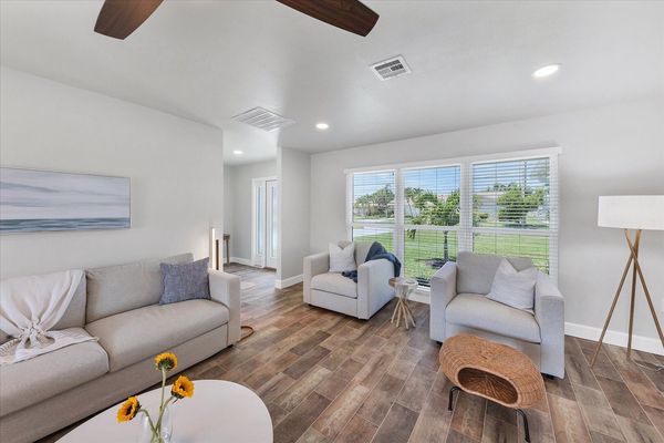 Bright and open living room
Full-size sleeper sofa
65" Smart TV