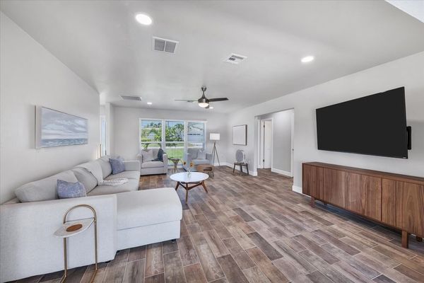 Spacious living room
Full-size sleeper sofa
65" Smart TV