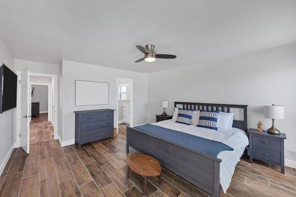 King master bedroom with Florida room access and ensuite bathroom