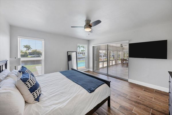 King master bedroom with Florida room access and ensuite bathroom