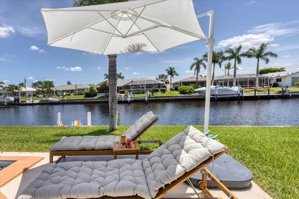 Soak up the sun by the canal and pool (Boat lift not available)