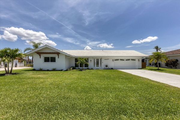 Classic Punta Gorda Isles Pool home on canal