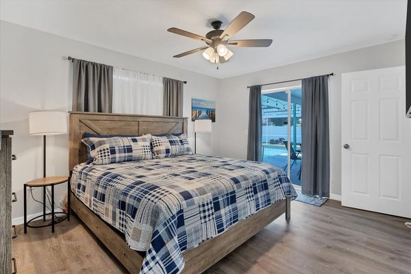 King Bed in the master bedroom with ensuite bathroom and lanai access