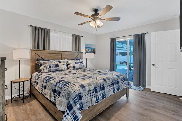 King Bed in the master bedroom with ensuite bathroom and lanai access