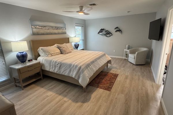 Primary bedroom with king bed and ensuite