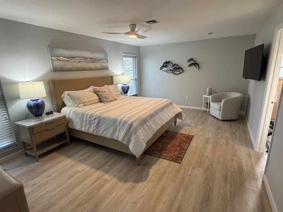 Primary bedroom with king bed and ensuite