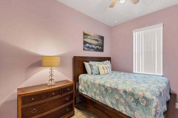 third bedroom with queen bed