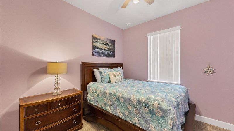 third bedroom with queen bed