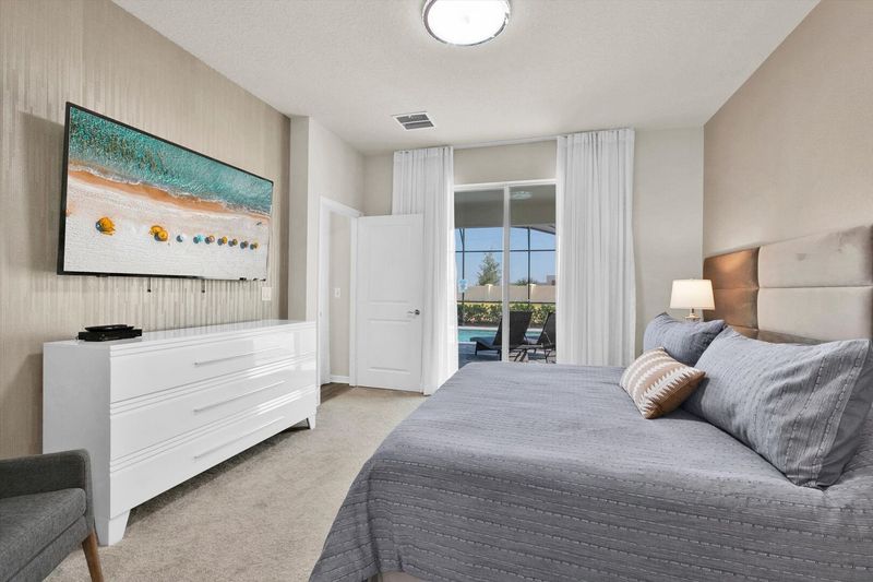 Master King Bedroom 1 (Angle)
65" Smart TV
Has Patio Doors to Pool Deck