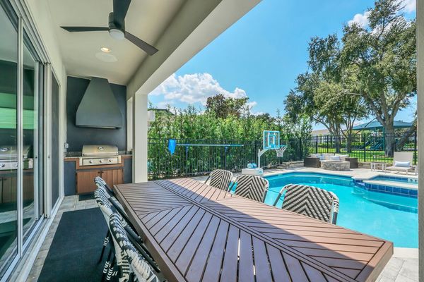 The privacy of this home is one-of-a-kind with simply nature surrounding your outdoor entertainment area and pool deck