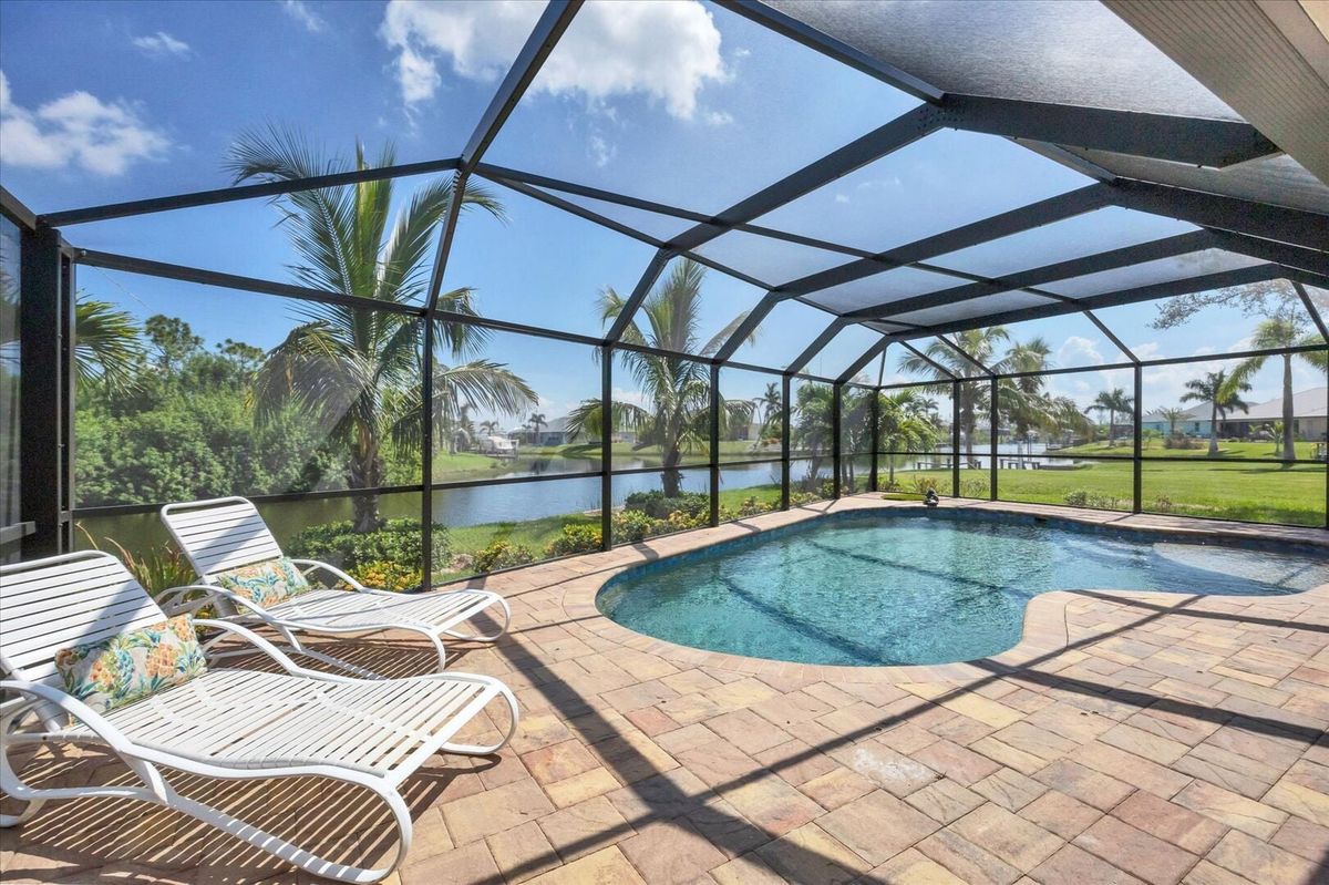 The perfect Florida vacation home- near the beach, your own pool, access to the canal waters of South Gulf Cove (Boat lift not available)