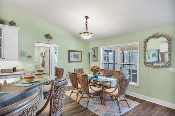 Seating for 6 at the table overlooking the pool and canal