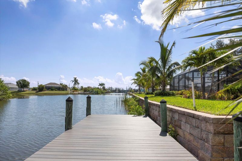 Spacious dock in the South Gulf Cove Canal system- guests are welcome to tie up their boats here (Boat lift not available)