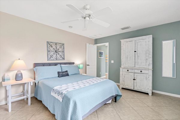 Guest bedroom 2 with one queen bed and 43" Smart TV