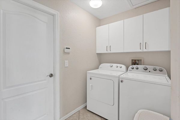 Laundry room leading to garage