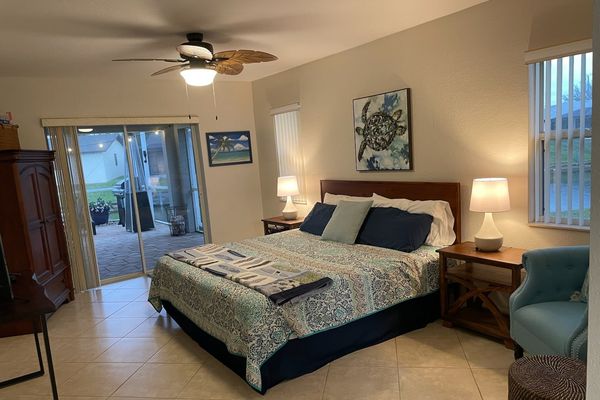 Primary bedroom with king bed & 43-inch Smart TV