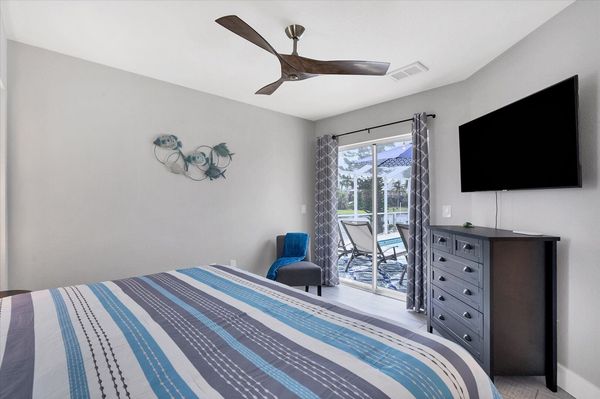 Bedroom #3 features a king bed, 48" Smart TV and lanao access