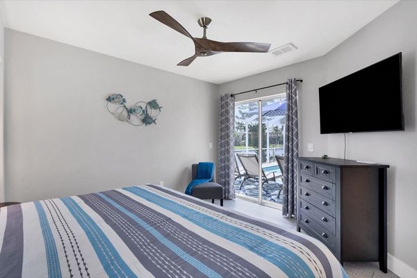 Bedroom #3 features a king bed, 48" Smart TV and lanao access