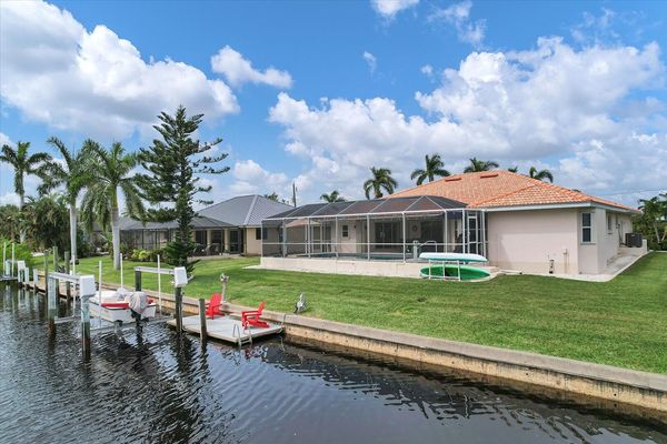 Canal front property in Punta Gorda Isles with dock and water frontage (Boat lift not available)