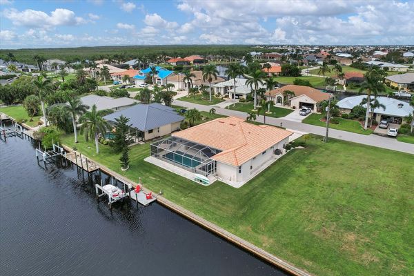Canal front property in Punta Gorda Isles with dock and water frontage (Boat lift not available)