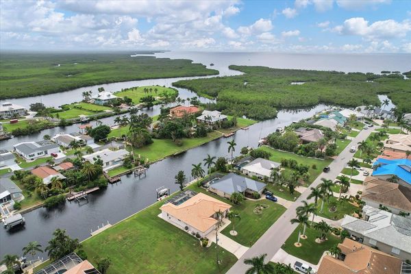 Canal front property in Punta Gorda Isles with dock and water frontage (Boat lift not available)