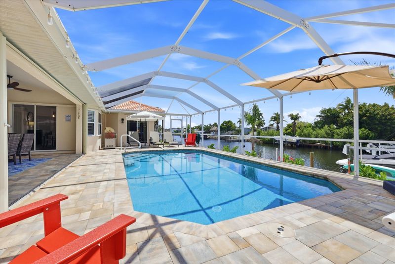 Sparkling pool overlooking canal. Pool 26' x 14' x 6'D  (Boat lift not available)